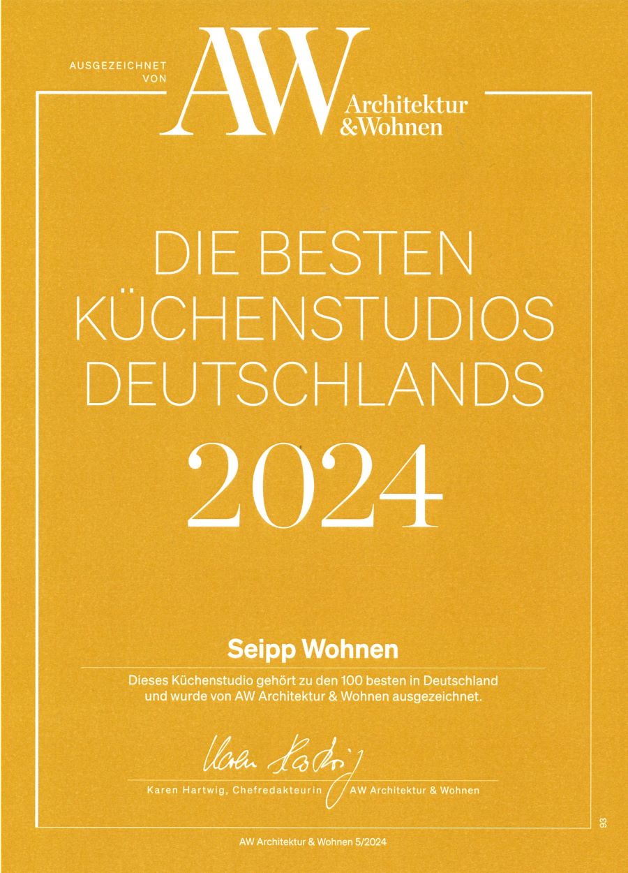 AW-Auszeichnung 2024: Seipp Wohnen zählt zu den besten Küchenstudios Deutschlands. Urkunde mit goldgelbem Hintergrund und Signatur.