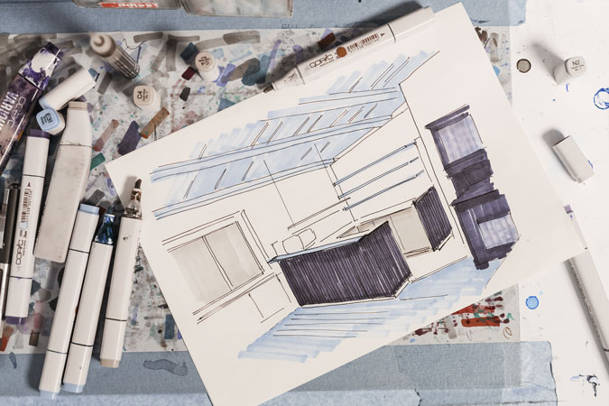 Skizze einer Küchenplanung mit Mittelinsel, gezeichnet auf Papier