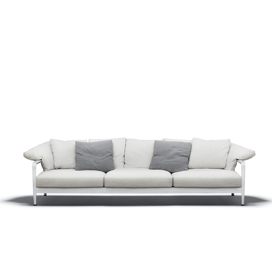 Knoll Sofa Lissoni mit schlanker, weißer Gestellstruktur und Polstern in einem hellen Naturton