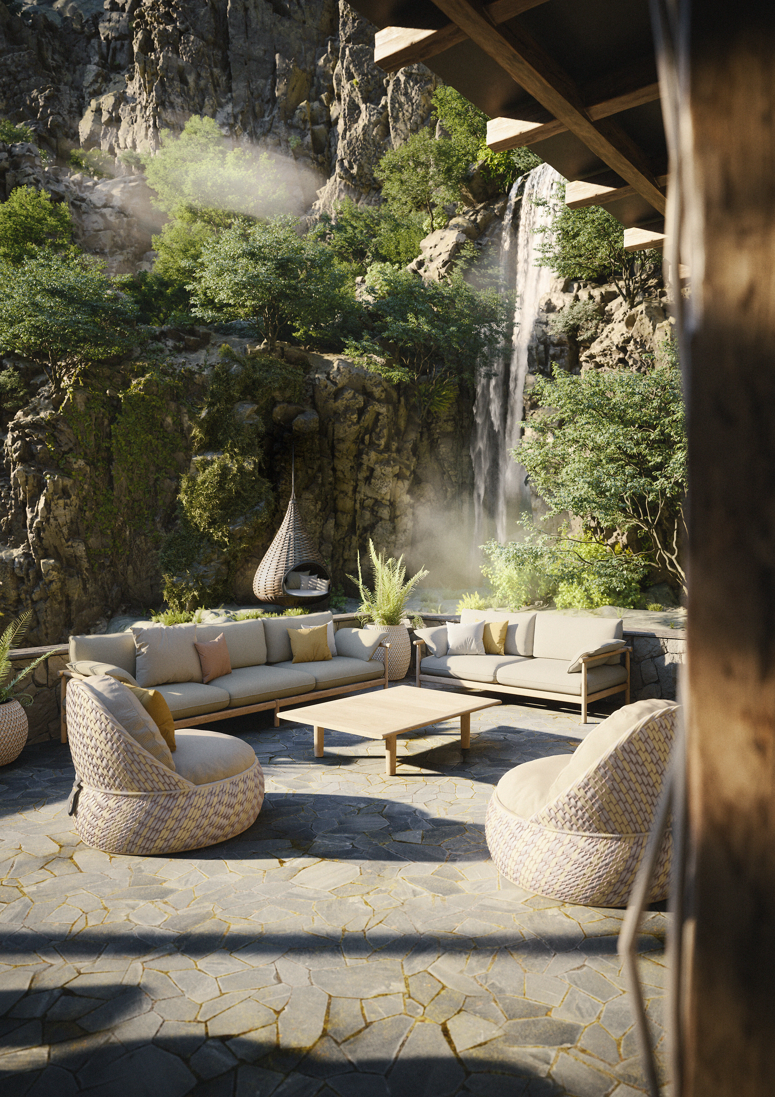 Große Outdoor-Sitzlandschaft mit Sesseln und Sofas vor Wasserfallkulisse auf Natursteinboden